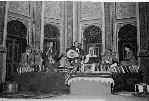 Cheikh Raymond Leyris playing oud with his orchestra